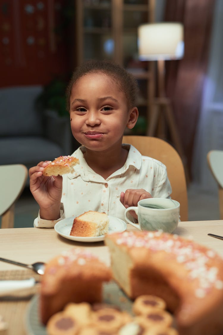 Girl Eating A Cake