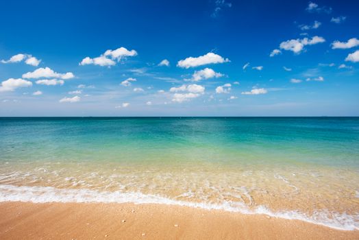 Tranquil beach with gentle waves under a clear blue sky, perfect for relaxation. - Fotografer Sidoarjo