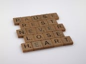 Close-up of Various Words Spelled out in Scrabble Tiles