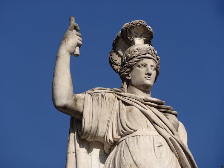 Classical Style Statue Against A Blue Sky