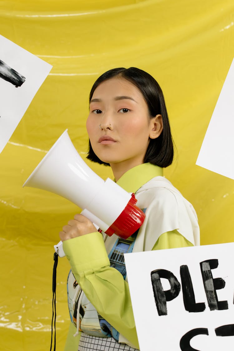 A Woman Holding A Megaphone