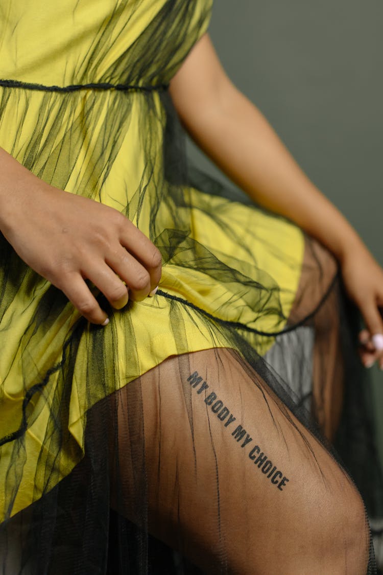 
A Woman Tattoo On Leg