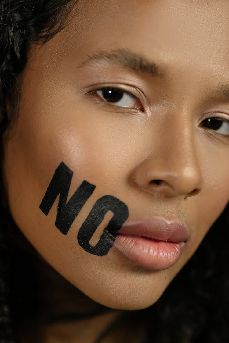 Woman's Face In Close Up Photography