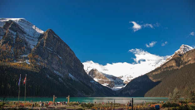 Lake Louise's stunning turquoise waters framed by majestic snow-capped mountains in Banff National Park.