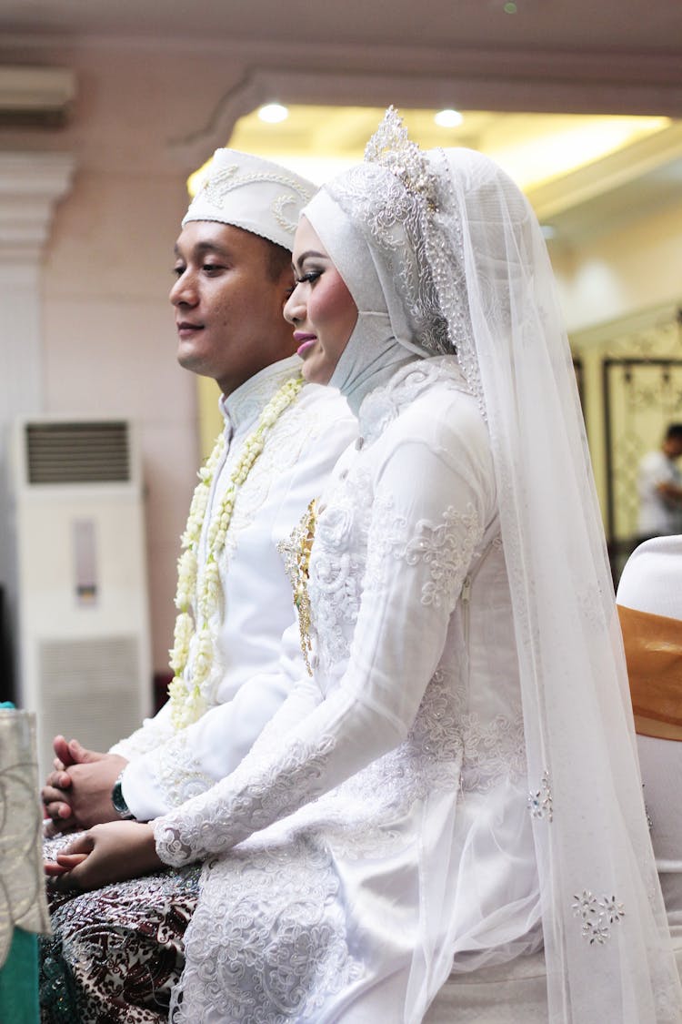 Portrait Of A Thai Bride And A Groom In Traditional Clothing