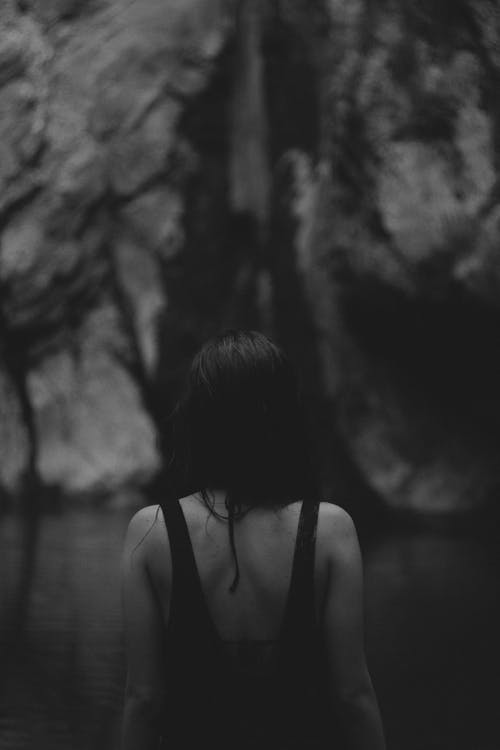 Person Standing in Black Bathing Suit