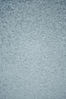 Detailed view of a frosty textured surface, showcasing natural ice patterns.