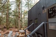 A Trailer Home in the Woods