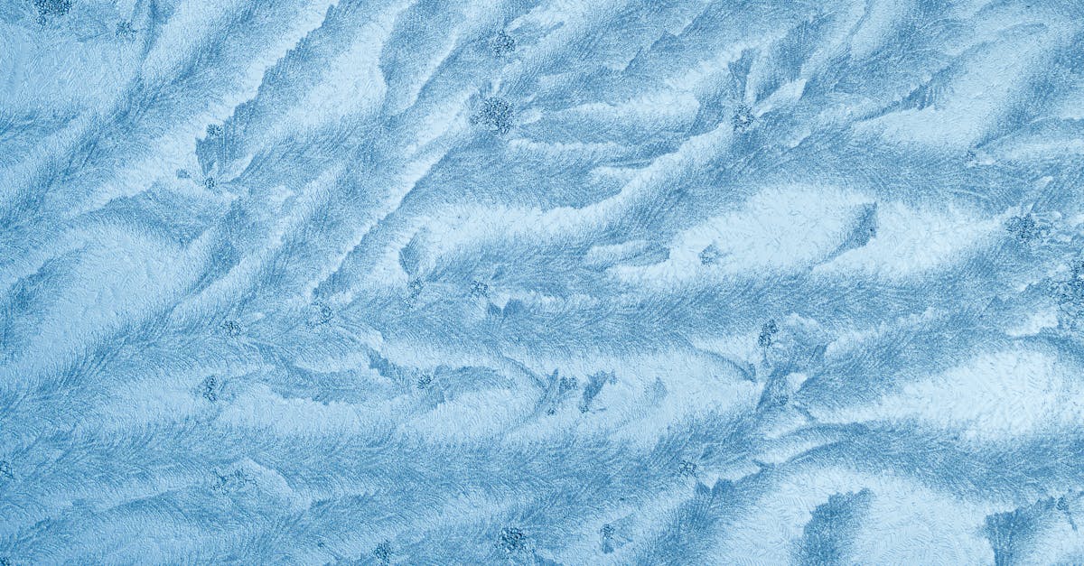 Blue Paint Patterns on a Wall · Free Stock Photo