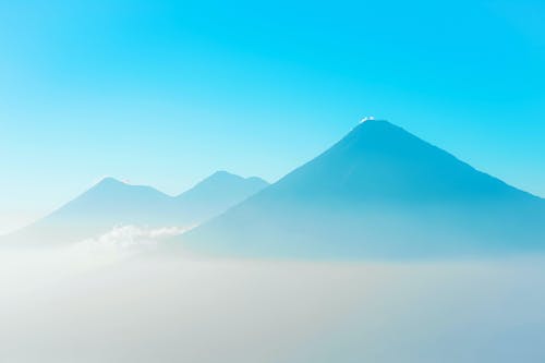 Mountains Rising above a Fog