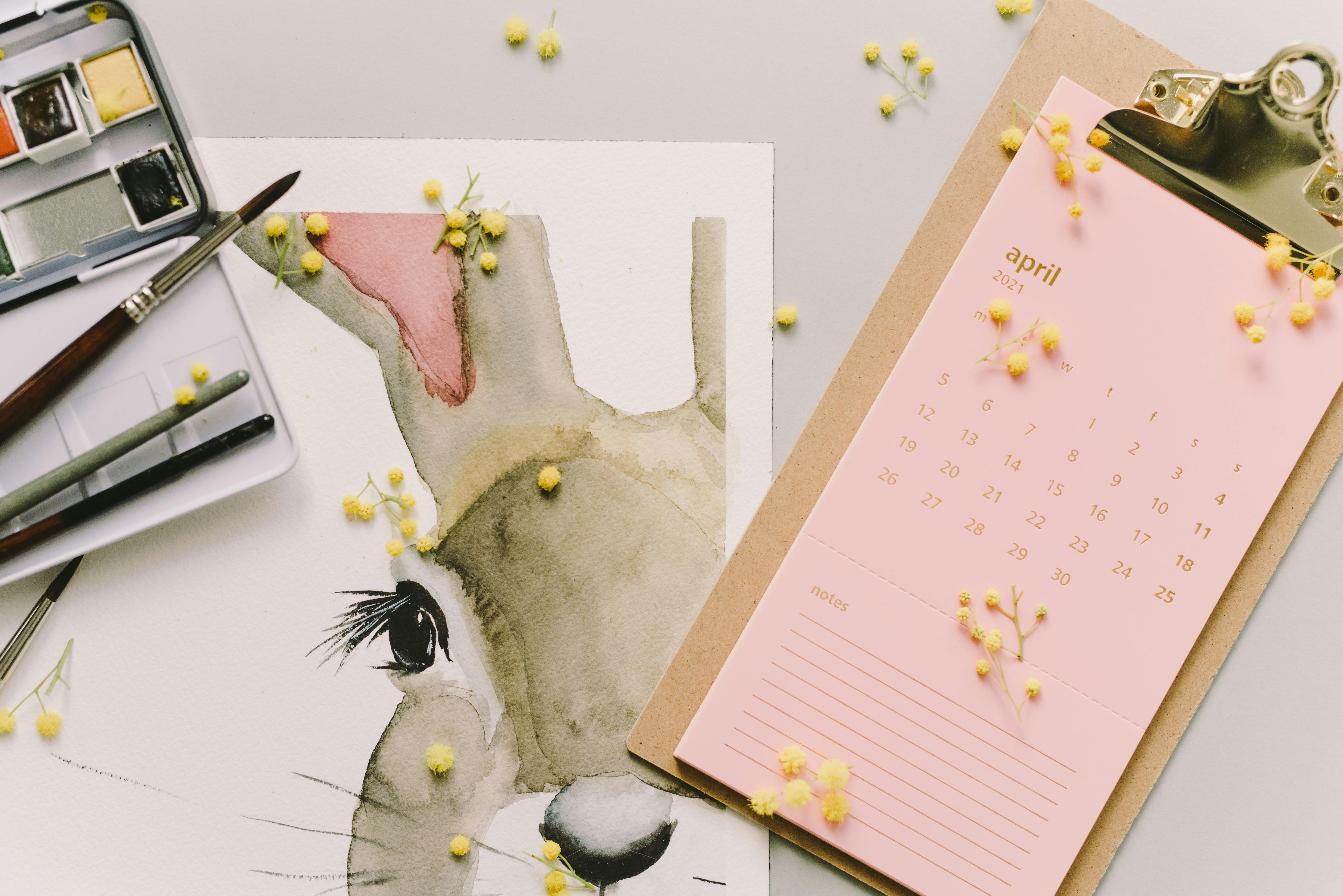 photo of calendar and painting of bunny