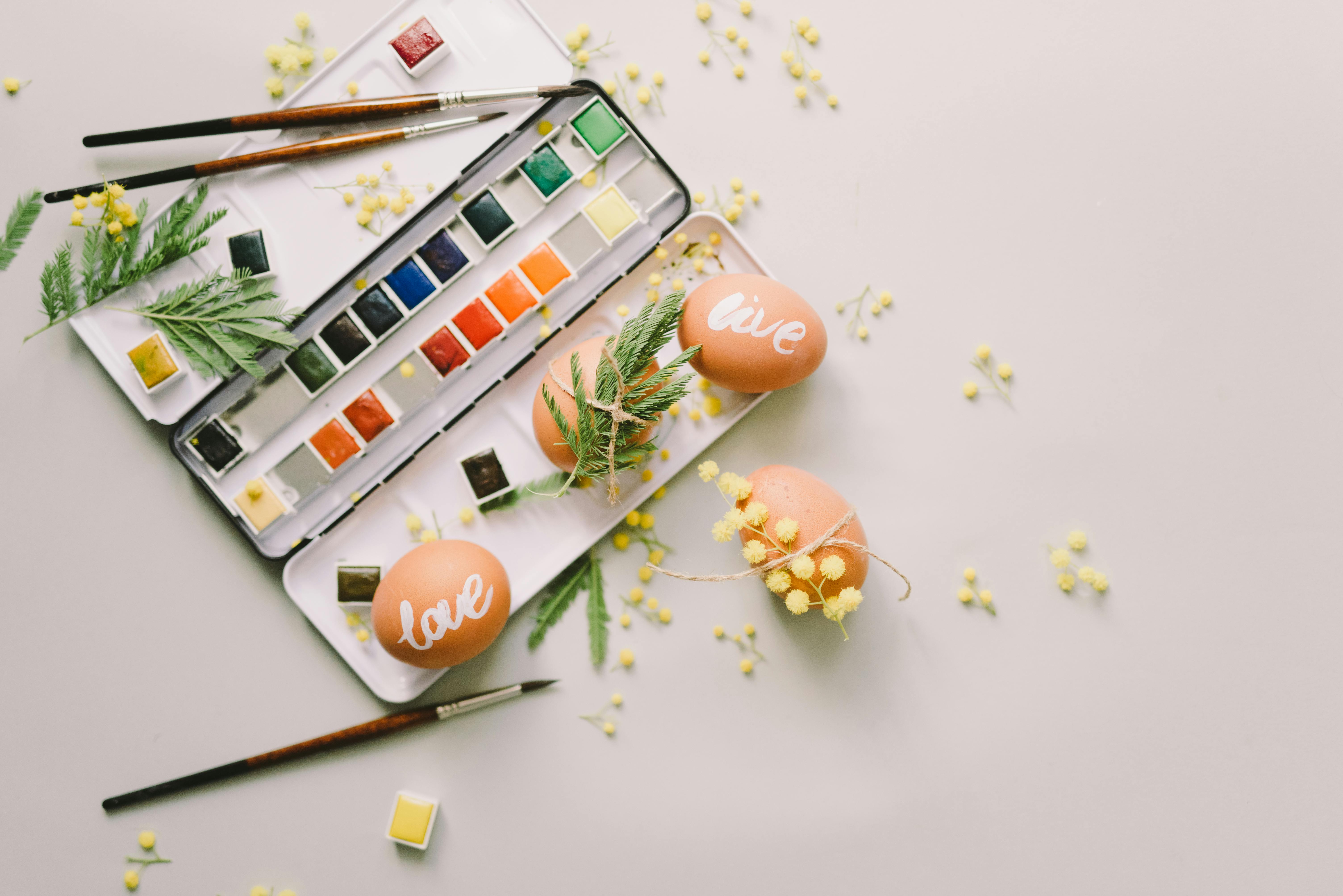 color palette beside painted eggs