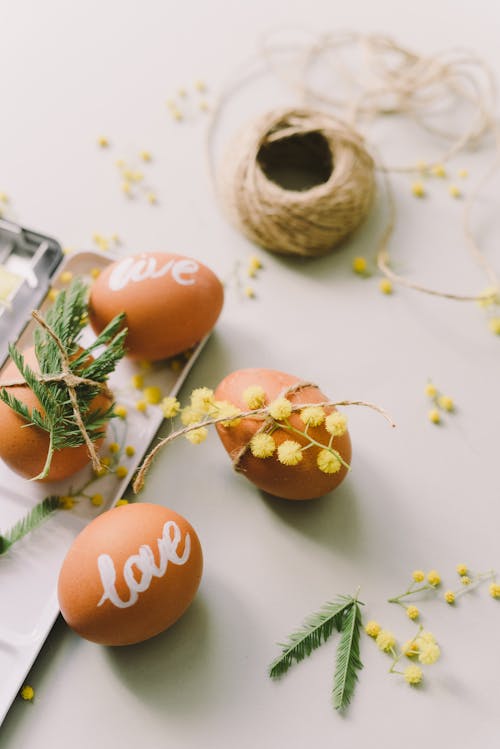 Painted Brown Eggs on White Table