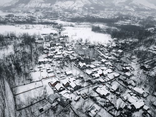 Kostnadsfri bild av byggnader, hus, snö