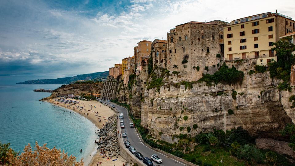 Sperlonga white houses above a clear-water bay