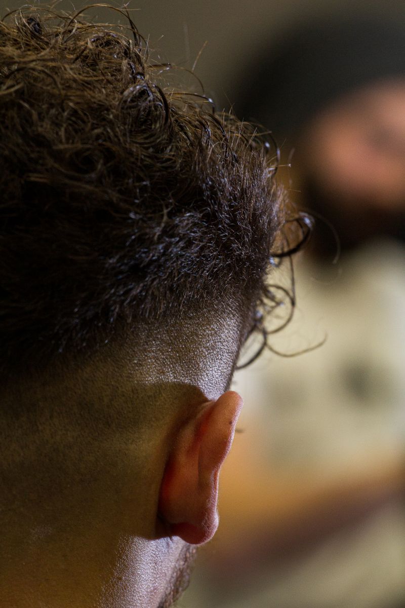 Coupe Burst Fade + Boucles homme
