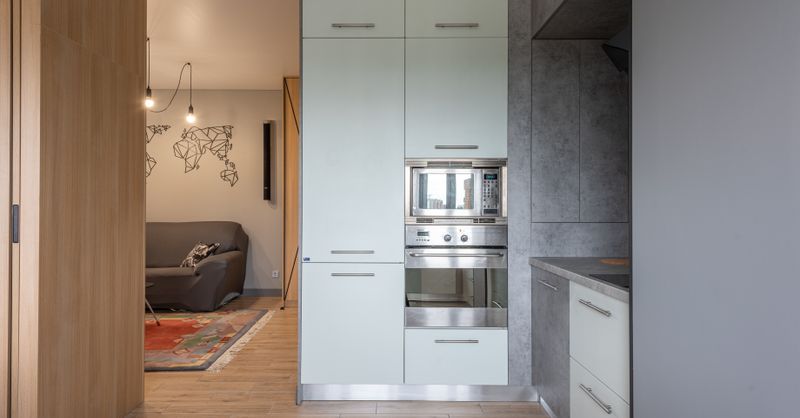 Hauteur meuble suspendu : Guide pose 2026