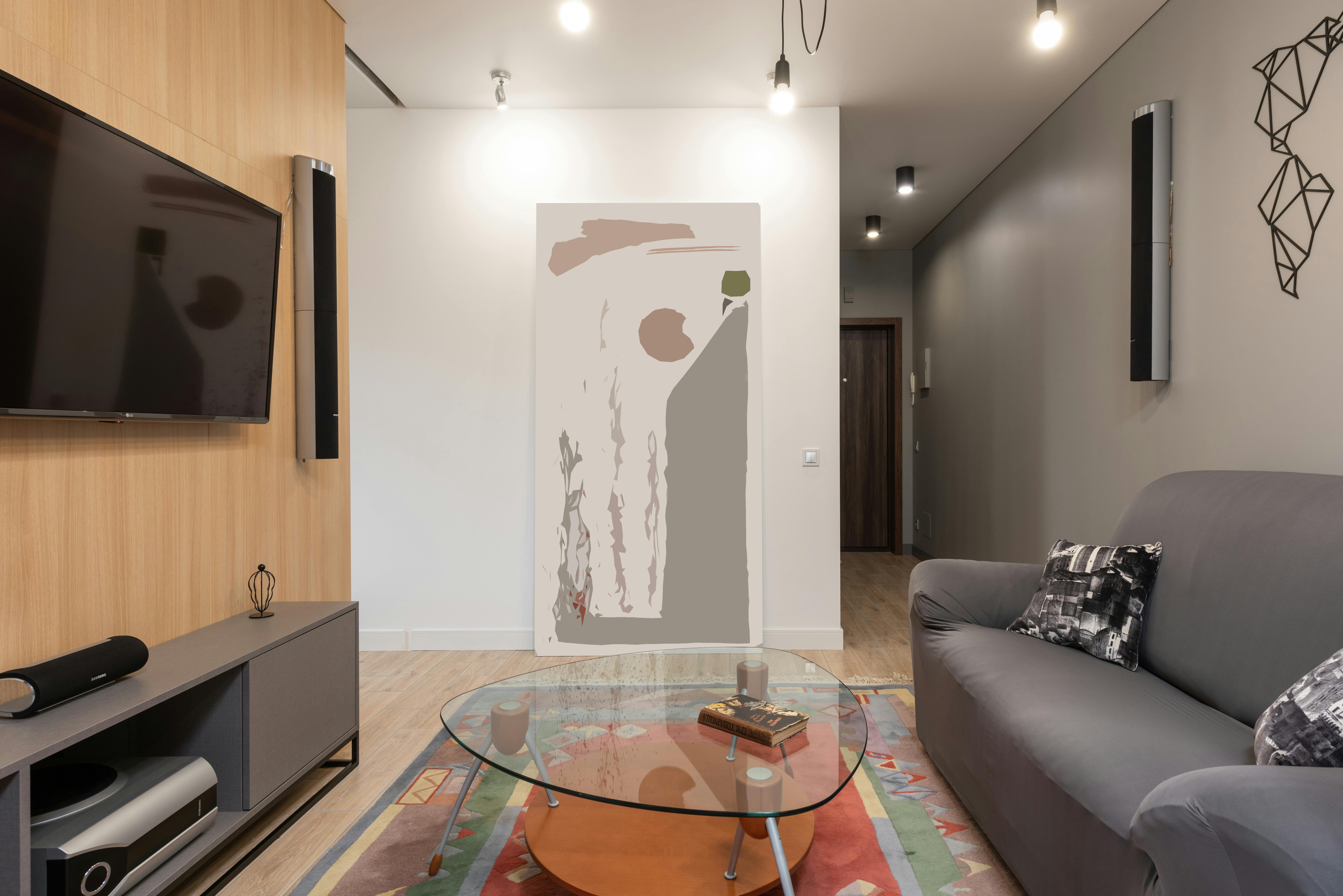 interior of living room with couch near table and tv