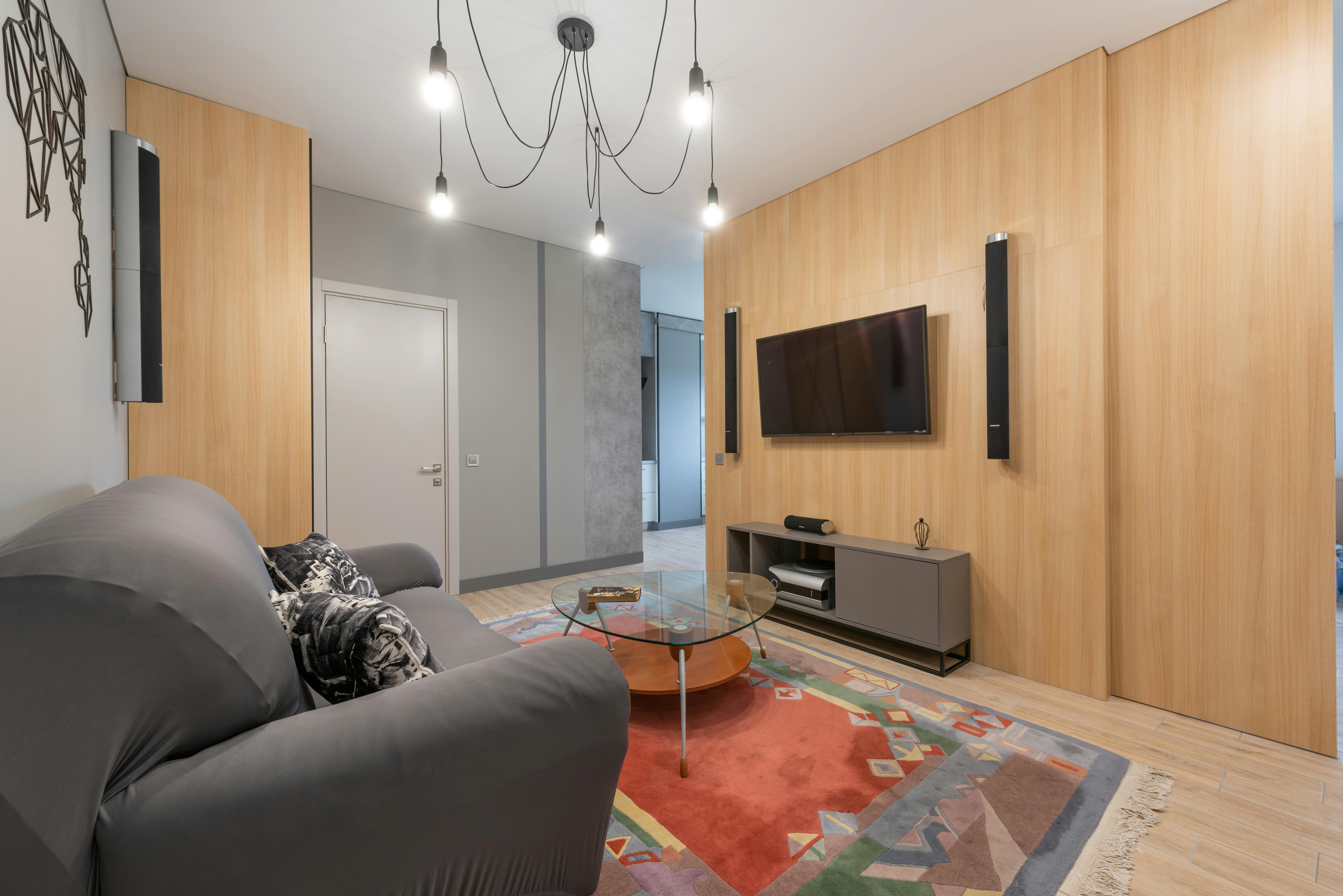 interior of living room with couch near table and tv