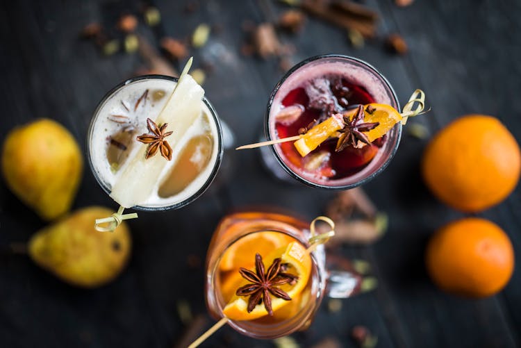 Assorted Beverages Of Spiced Wine With Fruit Garnish