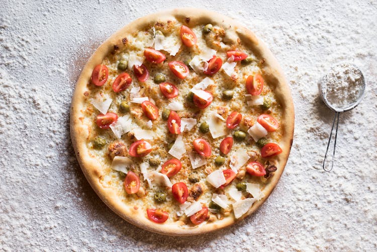 Tasty Pizza With Parmesan Cheese And Fresh Tomato Slices