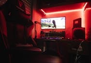 A Desktop Computer and Microphone on the Desk