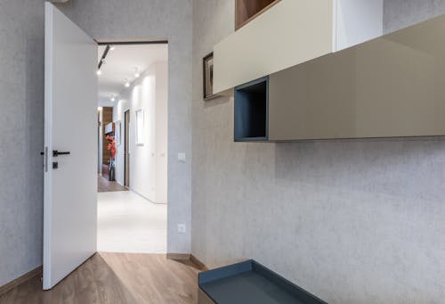 Empty modern apartment room and corridor
