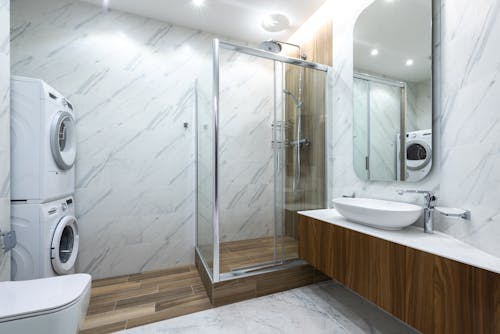 Interior of modern bathroom with shower cabin