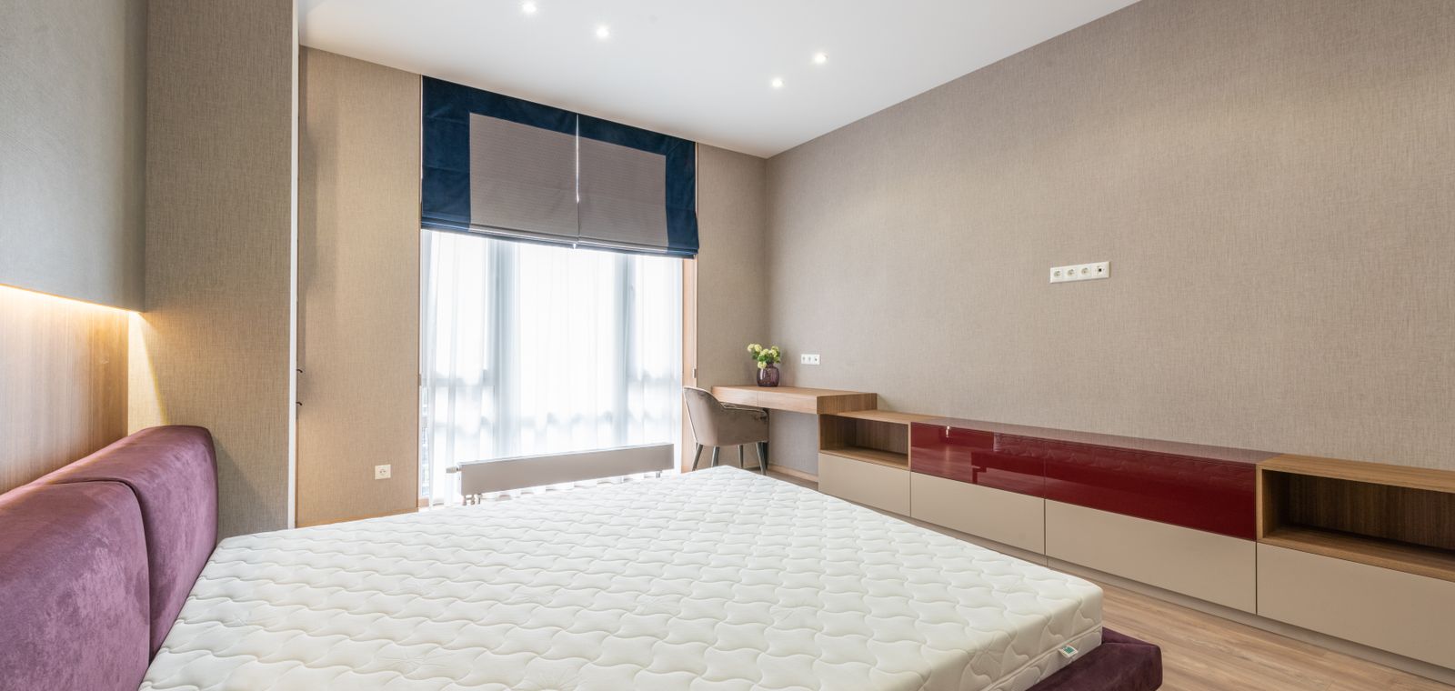 Bedroom with a white mattress