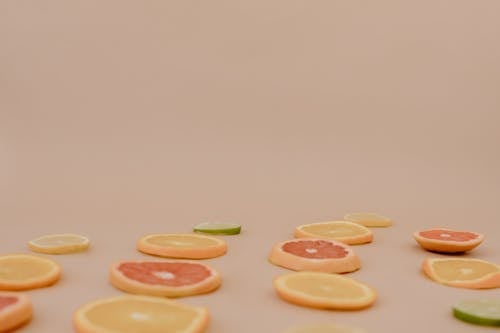 Free Sliced Citrus Fruits on a Surface Stock Photo