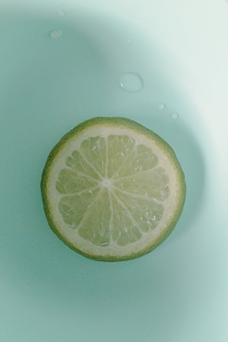 Juicy Lime Slice Placed In Bowl