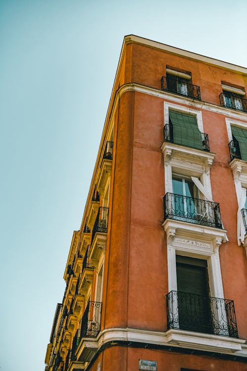 Brown Concrete Building Under a Blue Sky