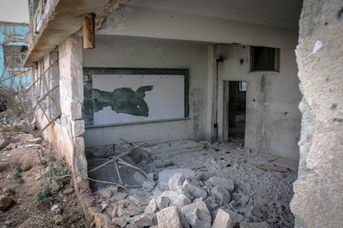 Dirty abandoned building with stones