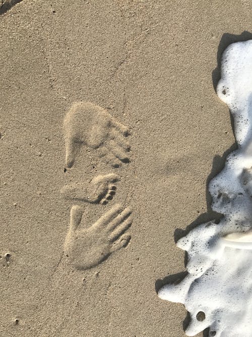 Free stock photo of baby foot, beach, handprints