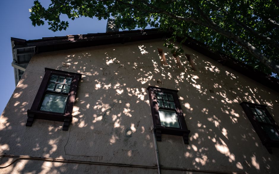 shaded home exterior with trees blocking direct sunlight shaded home exterior with trees blocking direct sunlight