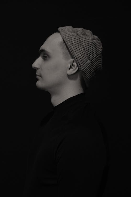 Side View of a Man Wearing a Beanie