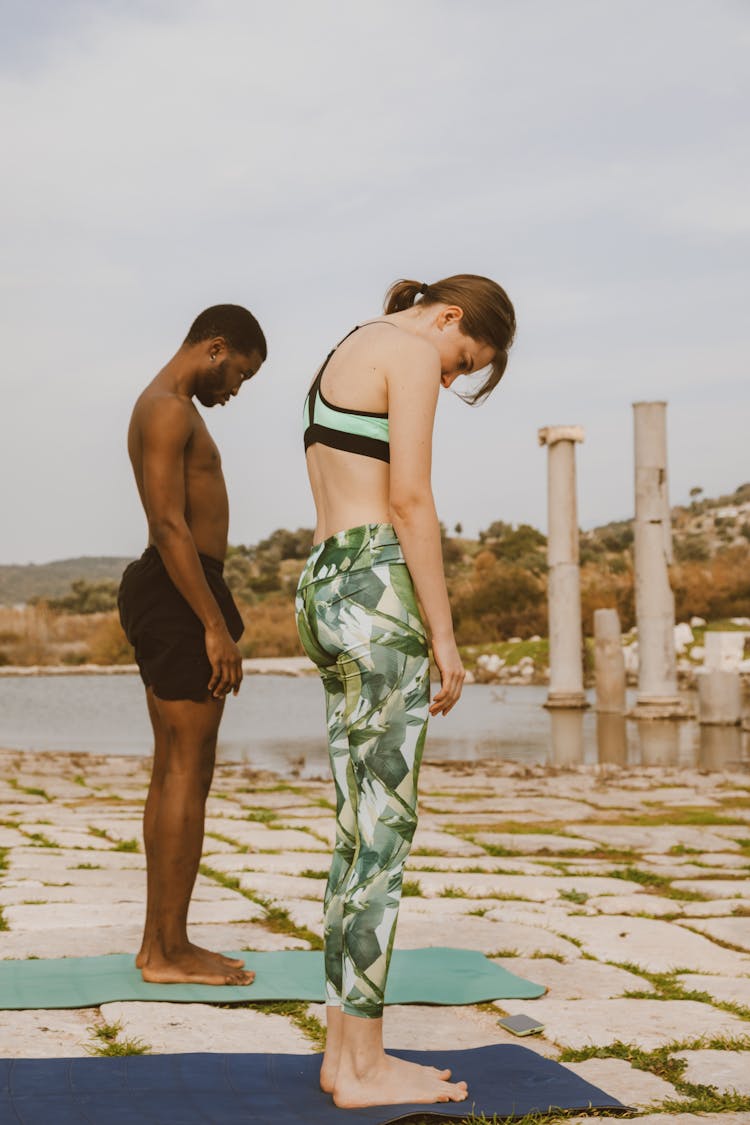 Woman And Man On Mats