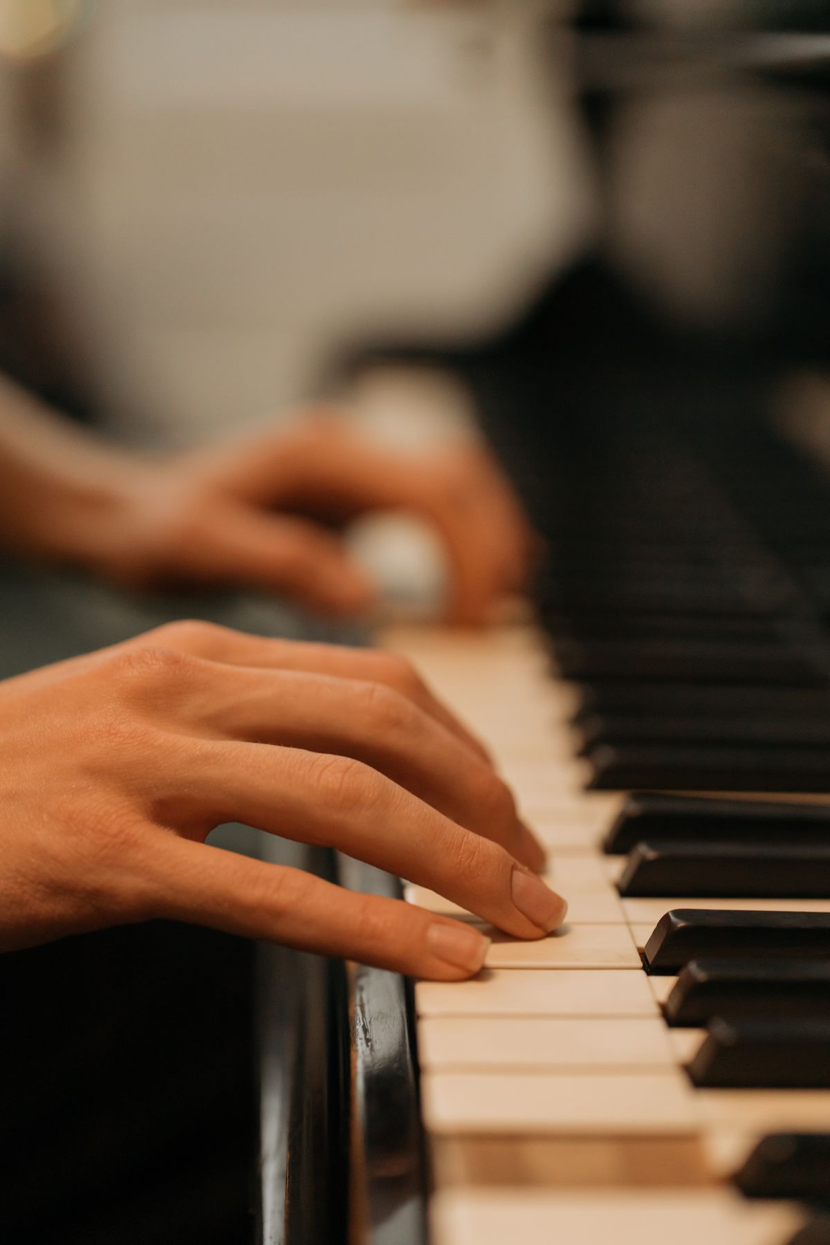Close study of hands drawing sound from the strings