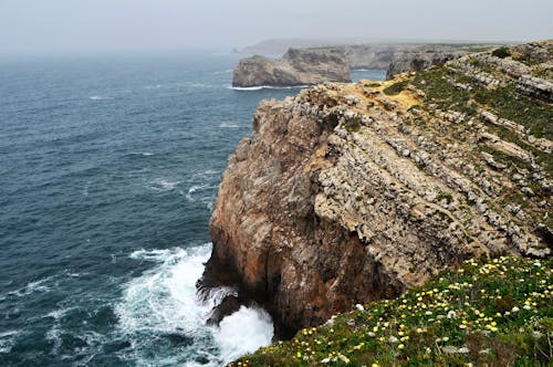 Ocean Waves Crashing to the Rocky Shore