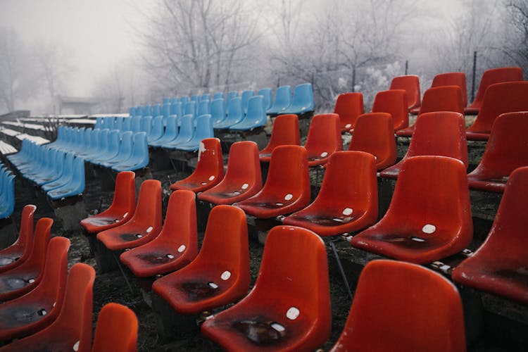 Empty Bleacher Chairs In Rows