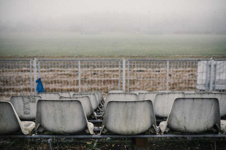 Dirty Seats In The Football Field Bleachers