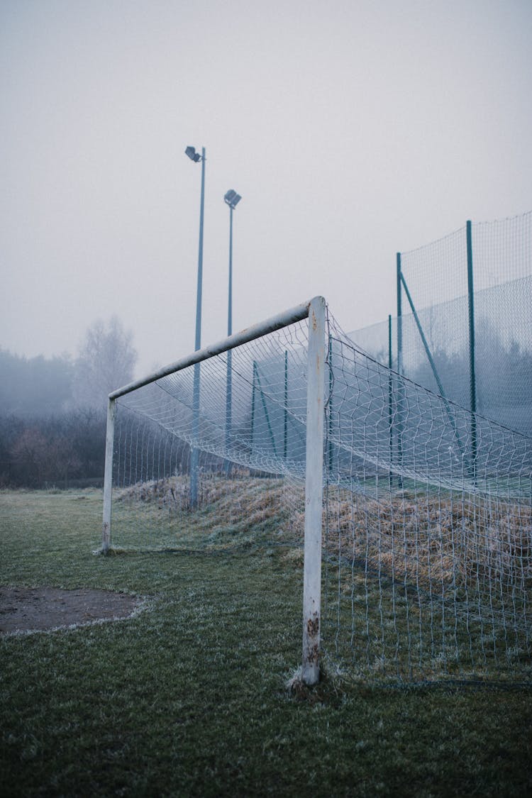 Soccer Goal On Grass Field On A Foggy Day