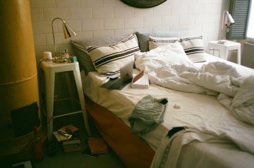 Free An Unkempt Bed in the Morning Stock Photo