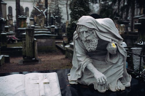 A Marble Statue on the Gravestone