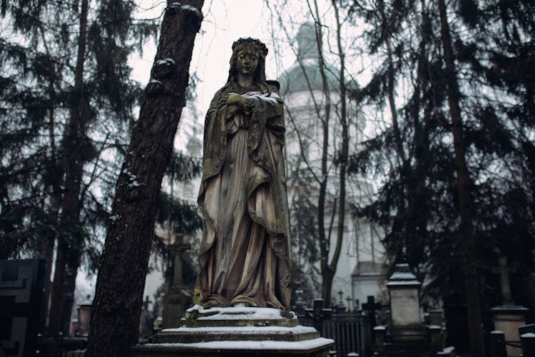 A Statue Inside A Cemetery