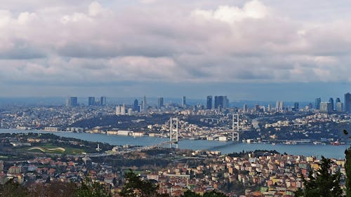 City Skyline Under White Clouds