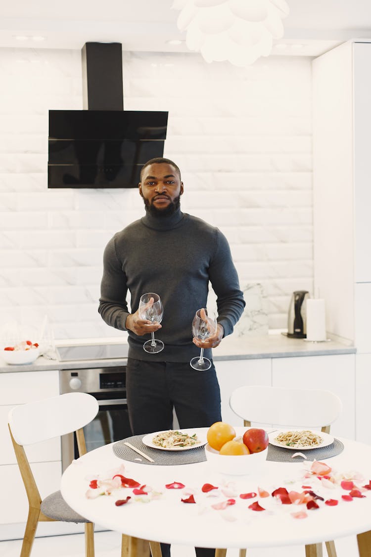 Man Preparing A Romantic Dinner At Home 