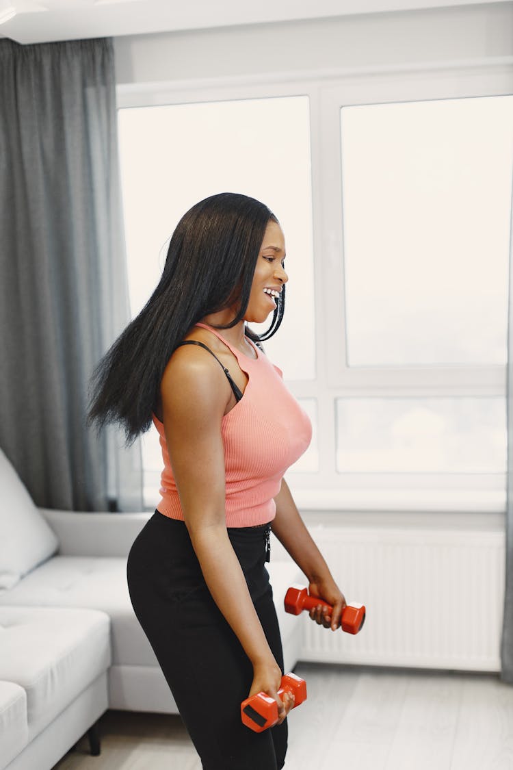 Woman Holding Dumbbells