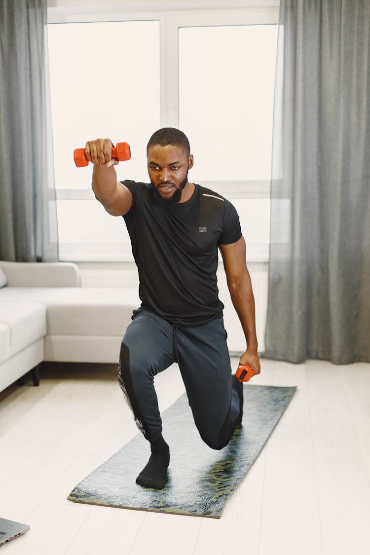 A Man Exercising At Home