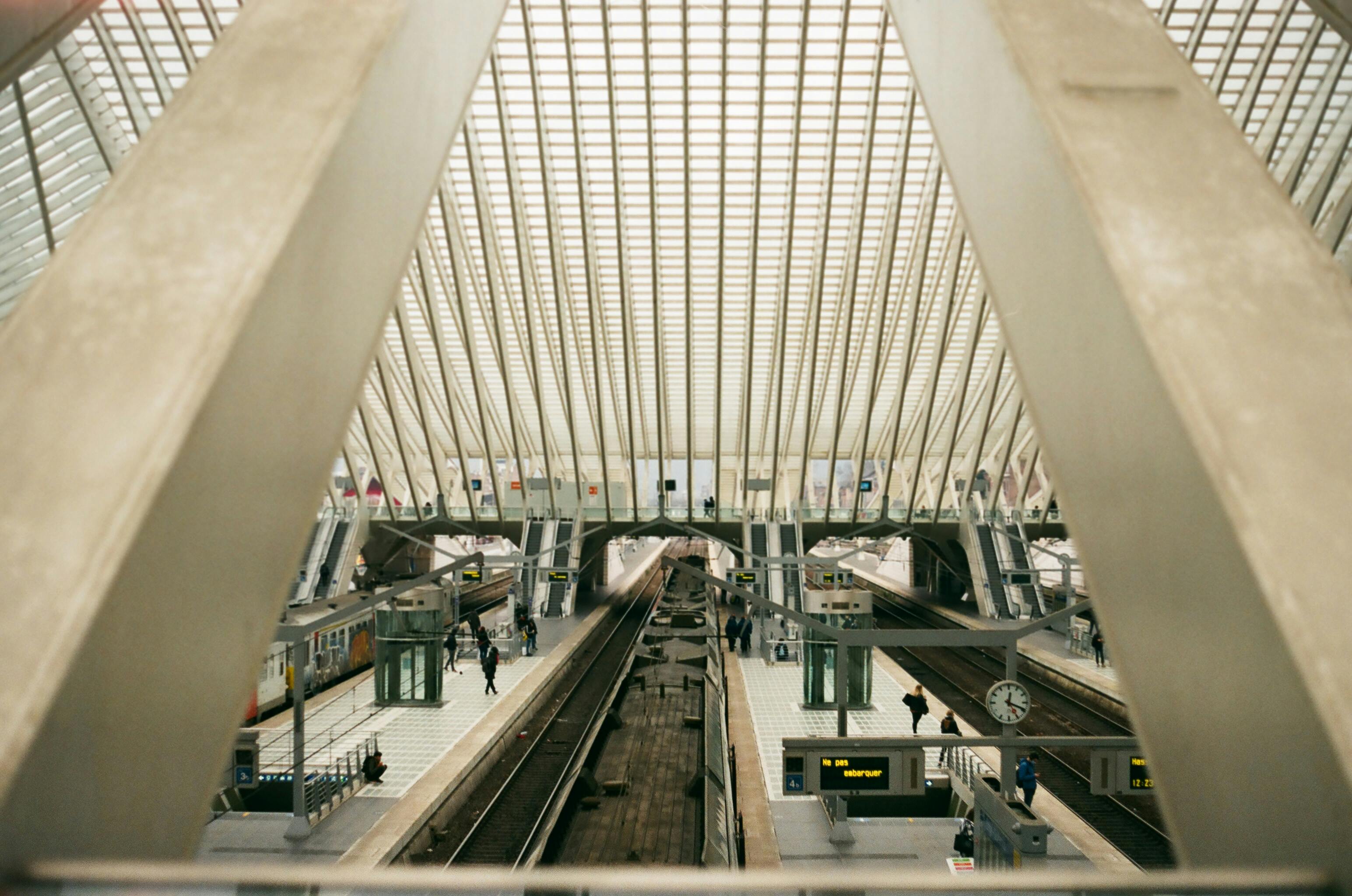 A view of the sleek, modern architecture of Liège Guillemins railway station in Belgium.